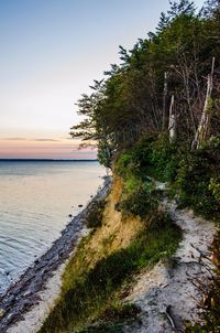 Scenic view of sea against clear sky during sunset