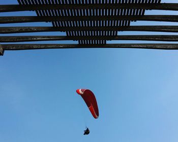 Low angle view of kite flying in sky