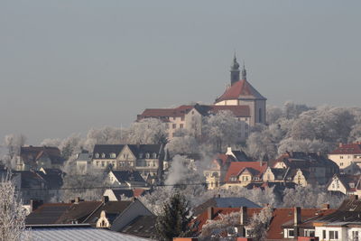 St. lioba chirch on petersberg under snow in winter, part of city fulda in hesse germany