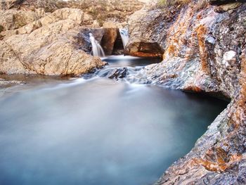 Water flowing through rocks