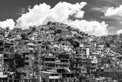 Buildings in city against sky