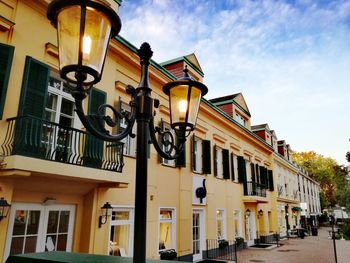 Low angle view of street lights in row