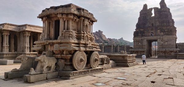Old temple building against sky