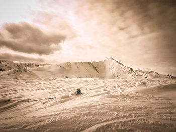 Scenic view of snowcapped mountain against sky