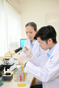 Female doctor working in laboratory