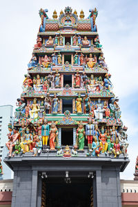 Low angle view of temple against building