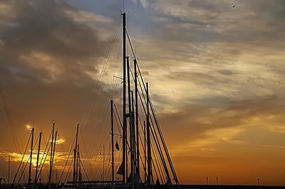 Low angle view of cloudy sky at sunset