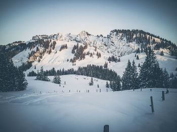 Scenic view of snowcapped mountain against sky