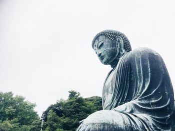 Low angle view of statue against clear sky