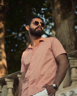 Young man looking away outdoors