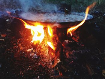 High angle view of bonfire at night