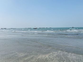 Scenic view of sea against clear sky