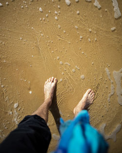 Low section of man on beach