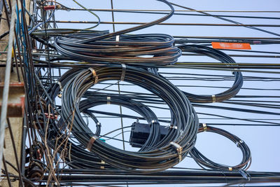 Close-up of cables against ceiling