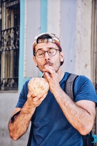 Man drinking coconut water