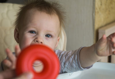 Portrait of cute baby at home