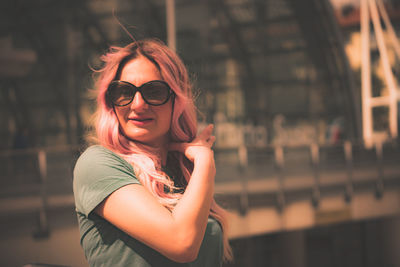 Portrait of young woman wearing sunglasses