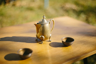 Vintage small patterned metal kettle with titan bowl