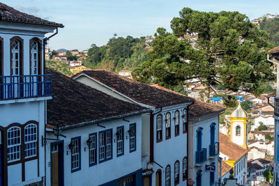 High angle view of residential buildings against sky