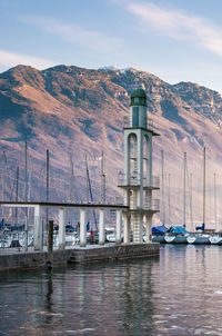 Lighthouse on pier at harbor