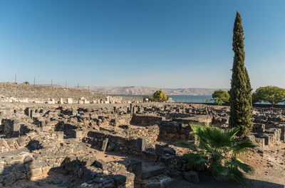 Ruins of building against blue sky