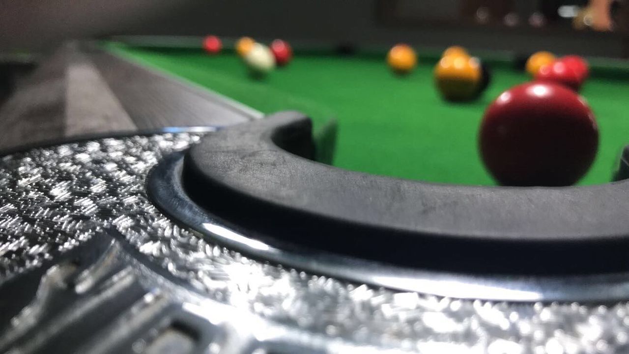 sport, close-up, table, leisure activity, ball, pool ball, selective focus, pool table, relaxation, green color, leisure games, pool - cue sport, no people, indoors, black color, arts culture and entertainment, playing, snooker, competition, recreational pursuit