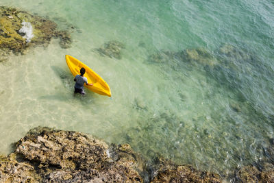 High angle view of man surfing in river