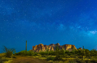 Scenic view of star field against clear blue sky