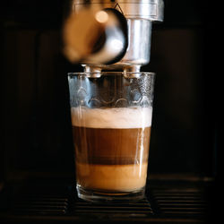 Close-up of coffee cup on table