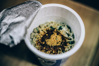 High angle view of cigarette in bowl on table