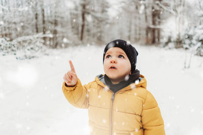 Portrait of girl looking in snow