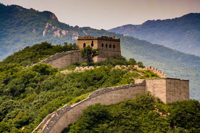 Low angle view of great wall of china on mountain