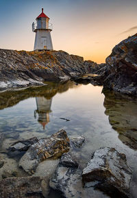 Tidal pool infront of lighthouse on vigra, norway