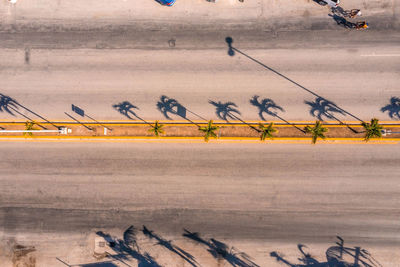 High angle view of airplane on airport runway