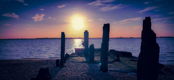 Scenic view of sea against sky during sunset