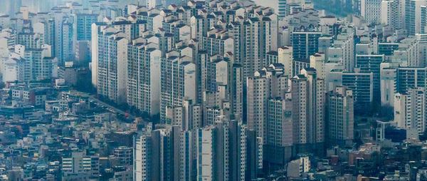 High angle view of modern buildings in city