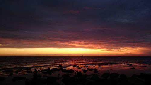 Scenic view of sea at sunset