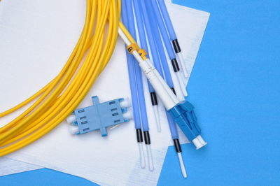 Close-up of dental equipment on blue background
