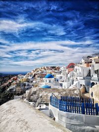 High angle view of townscape against cloudy sky