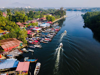 High angle view of river while fisherman going out