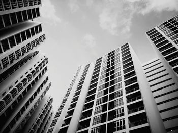 Low angle view of modern buildings against sky