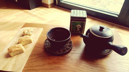 Close-up of coffee cup on table