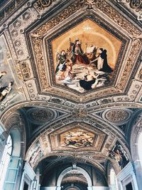 Low angle view of ornate ceiling of building