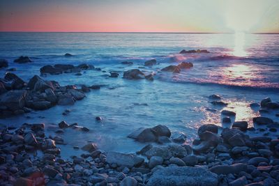 Scenic view of sea against sky during sunset