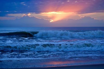 Scenic view of sea against sky during sunset