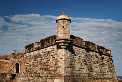 Low angle view of historic building against sky