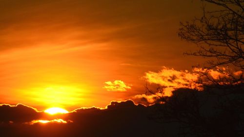 Scenic view of dramatic sky during sunset