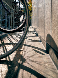 Shadow of bicycle on footpath