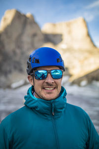 Portrait of climber wearing blue