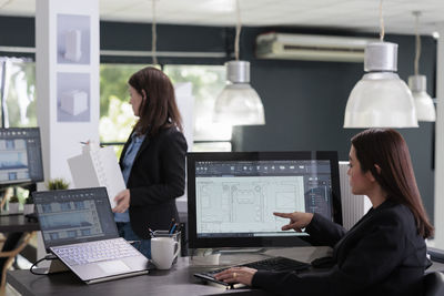 Businesswoman working on table